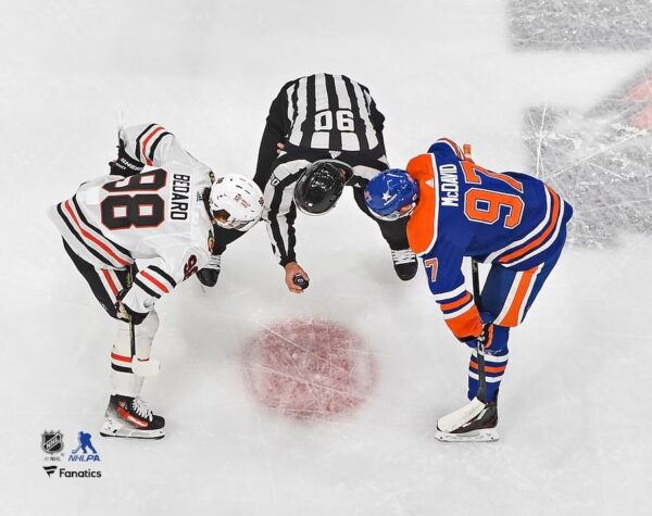 Connor Bedard Chicago Blackhawks vs. Connor McDavid Edmonton Oilers Unsigned Faceoff Photograph