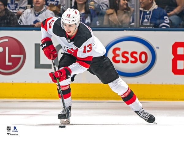 Nico Hischier New Jersey Devils Unsigned White Jersey Skating Photograph