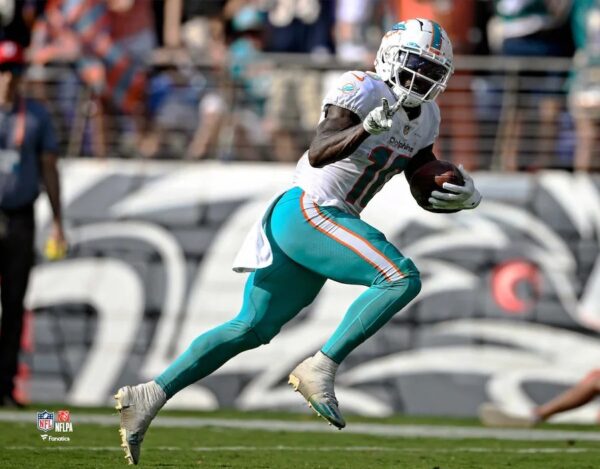 Tyreek Hill Miami Dolphins Unsigned Celebrates a Touchdown Photograph